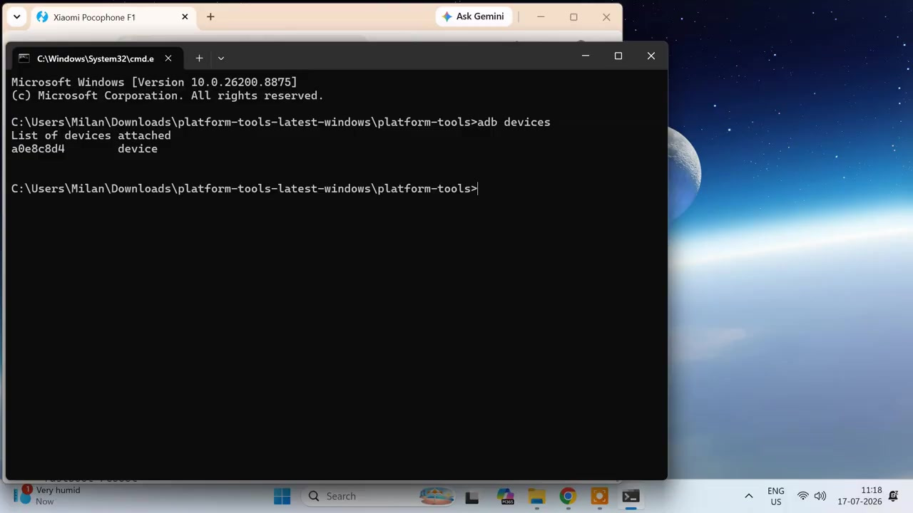 Command Prompt showing a phone detected by the adb devices command