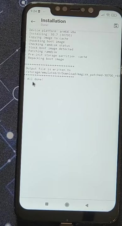 Magisk installation log showing the patched boot image and All done message
