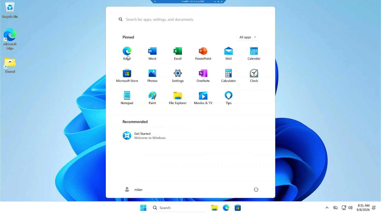 Windows 11 desktop opened through WinBoat with the Start menu with Office and system apps