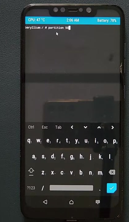 Modified TWRP terminal showing the partition command with 50 GB allocated to Windows