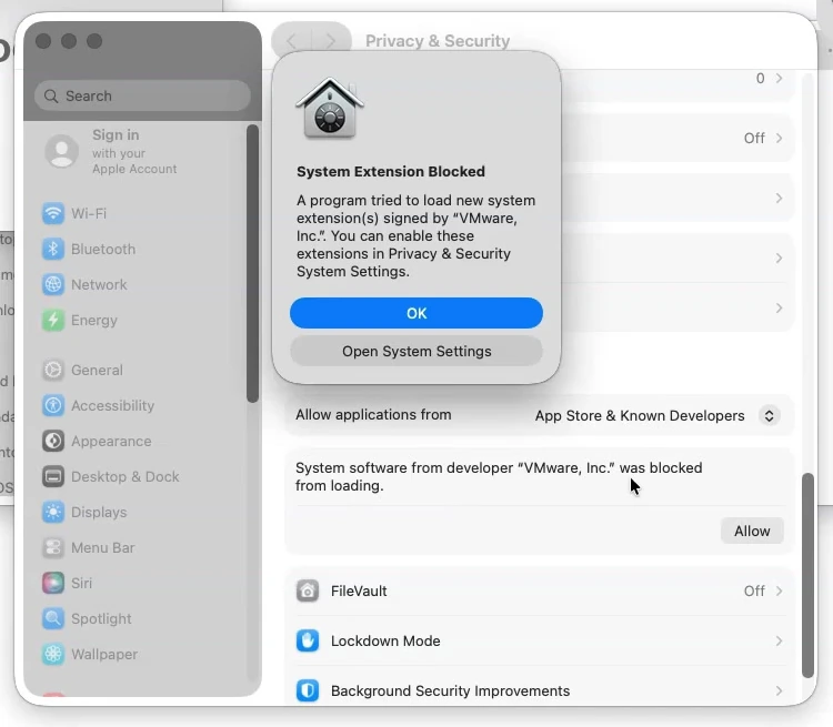 macOS Privacy and Security showing the blocked VMware extension and Allow button