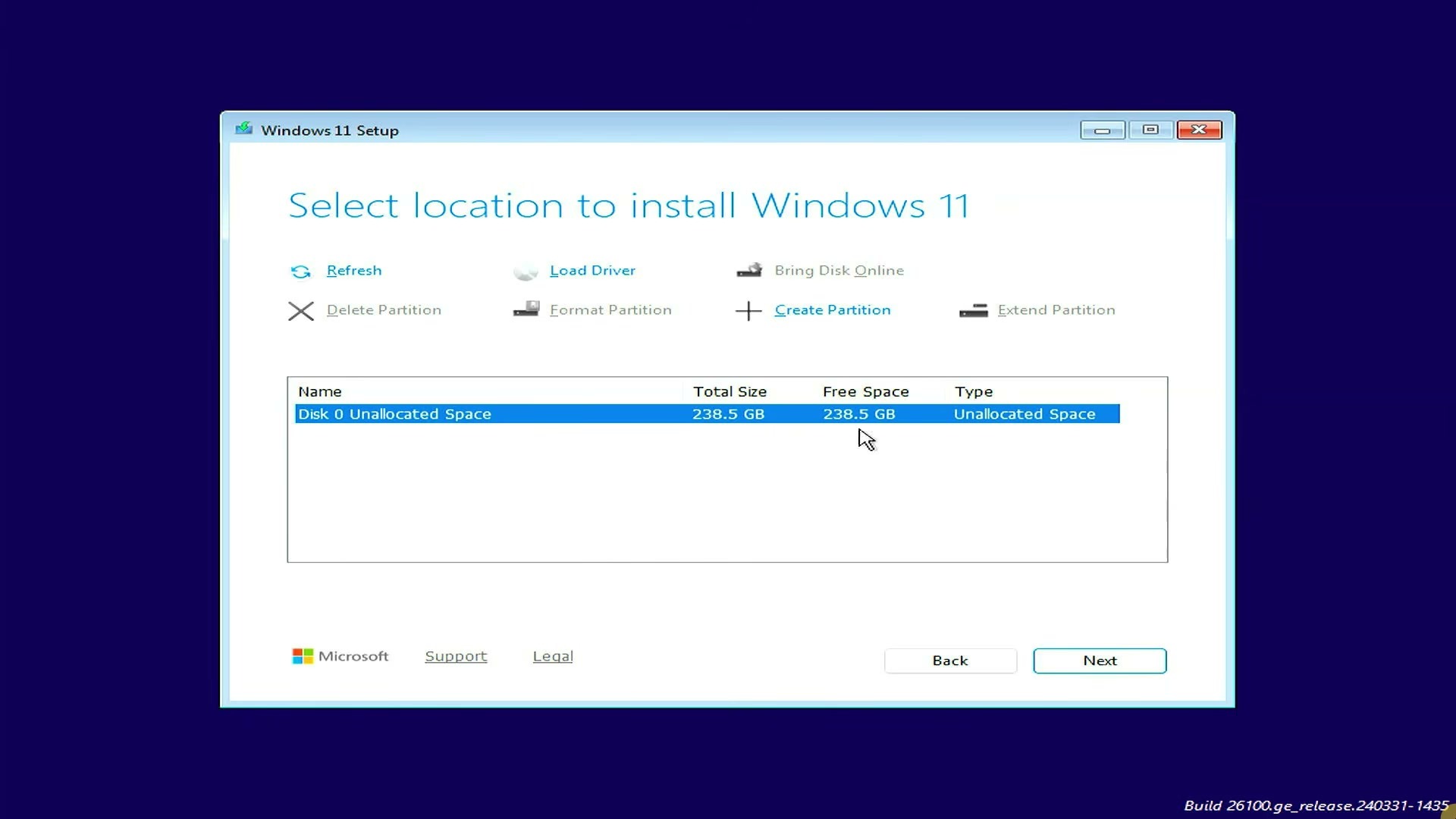Windows 11 Setup showing unallocated space selected as the installation destination