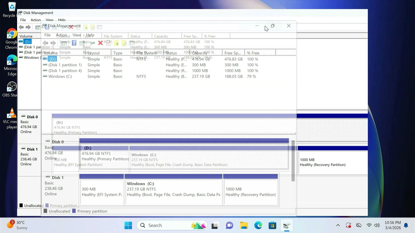 Windows Disk Management showing the original Windows SSD and the larger destination disk