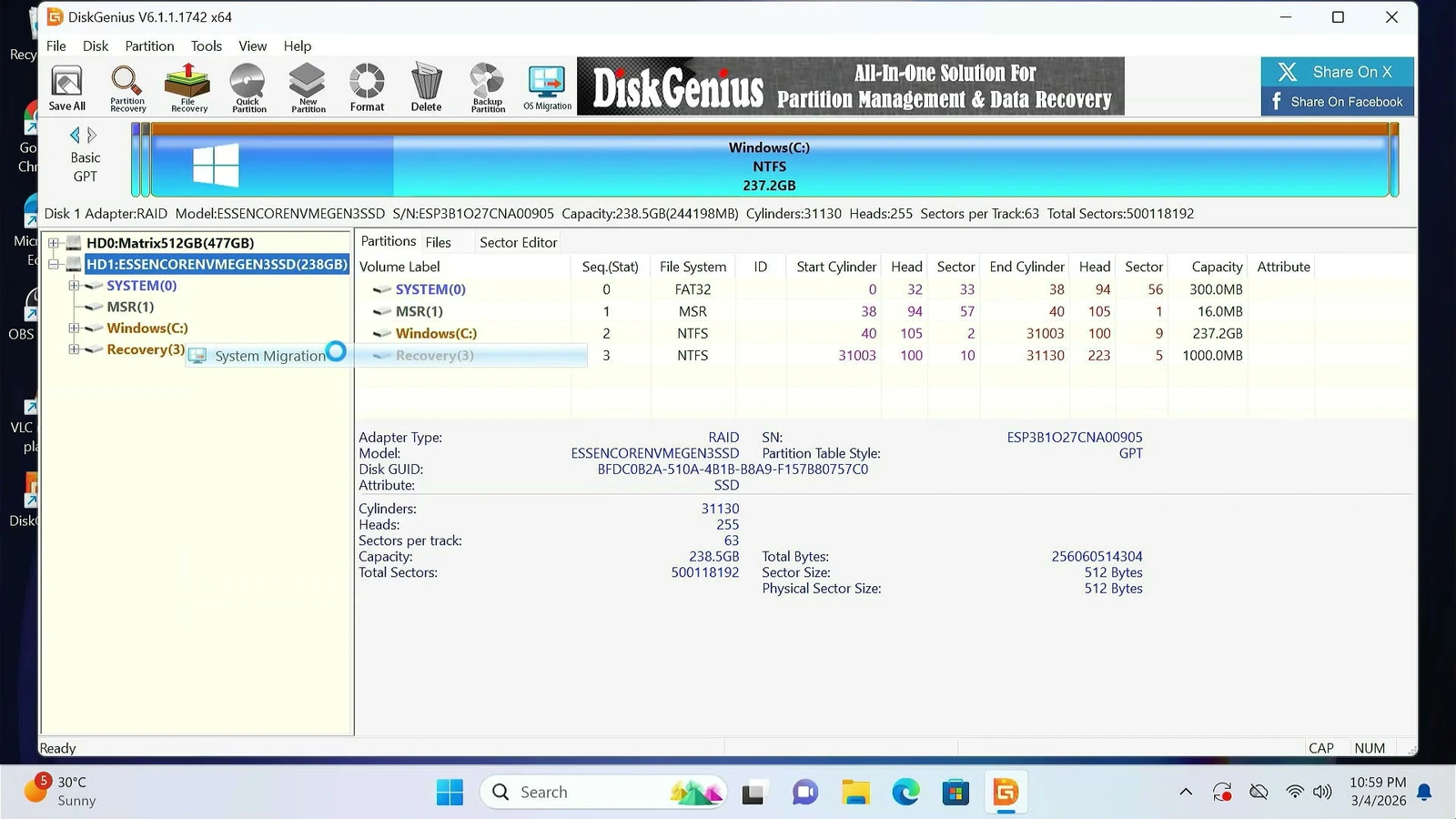 DiskGenius showing the Windows system disk and OS Migration toolbar button
