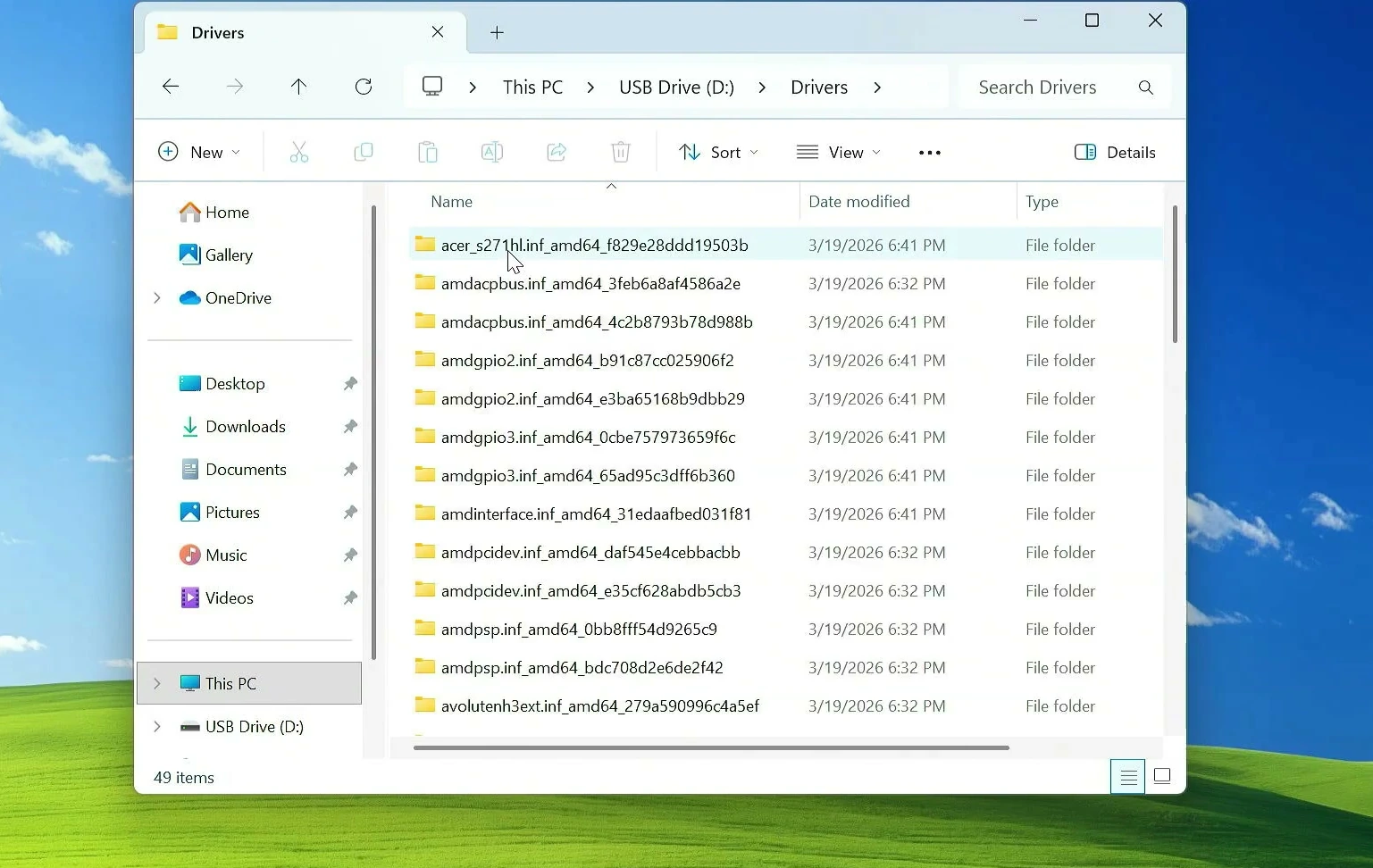 Exported Windows driver packages stored in separate folders on the USB drive