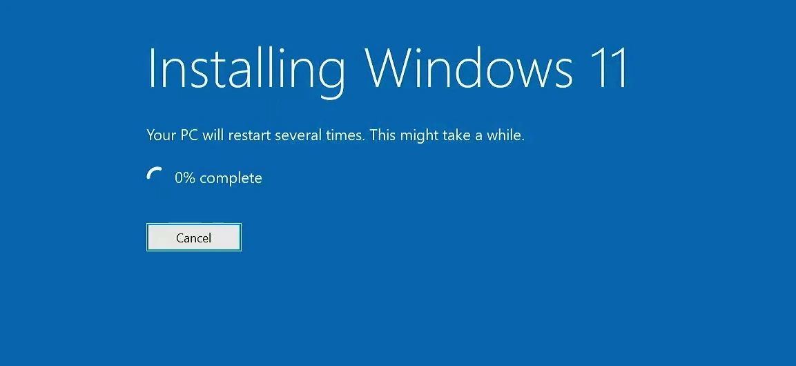 Windows 11 installation progress screen showing that the PC will restart