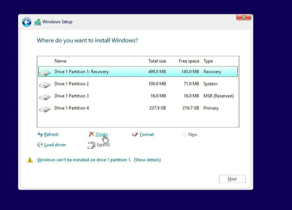 Windows installation screen displays storage partitions after loading the driver